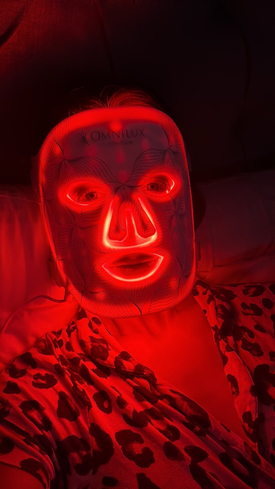 Rebecca wearing an LED mask